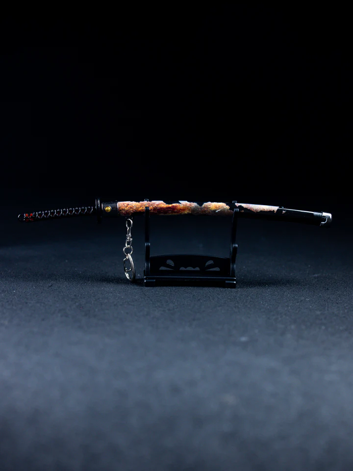 Rivers of Blood Keychain + Stand - Image 3